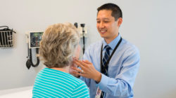 Doctor examining a patient.