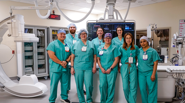 The Catheterization Lab team poses with the new Phillips Azurion Image Guided Therapy System. 